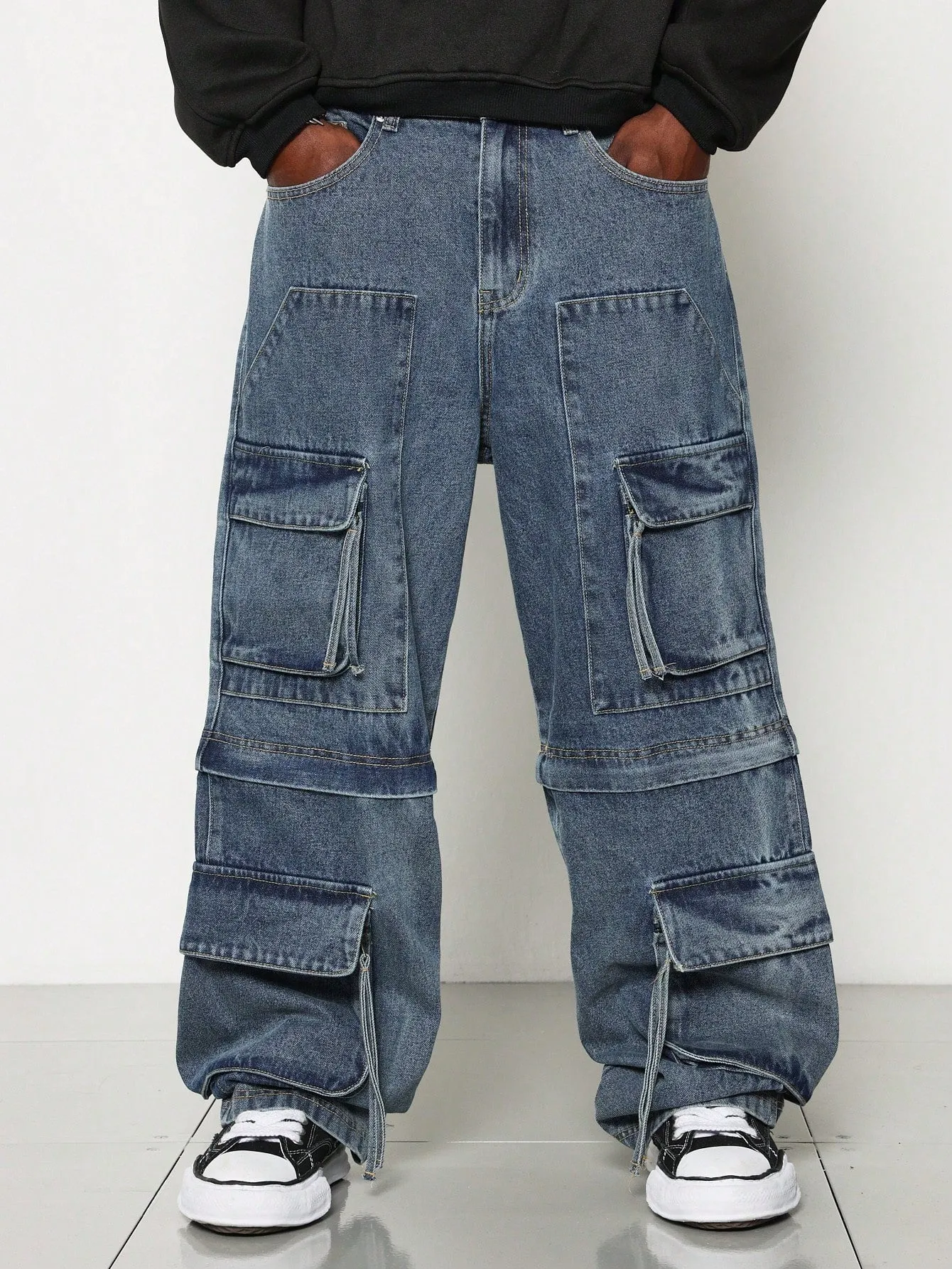 Loose Fit Washed Multi Pocket Cargo Jean With Hidden Zipper Convertible To Short